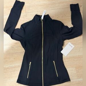 Jacket Lululemon in black with gold zipper